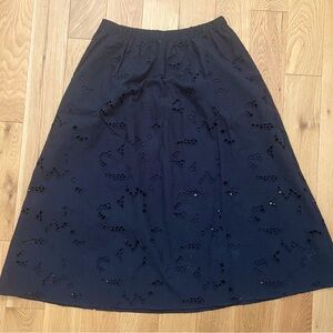 MIDI length eyelet skirt